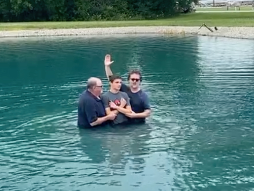 Sam Haley being baptized