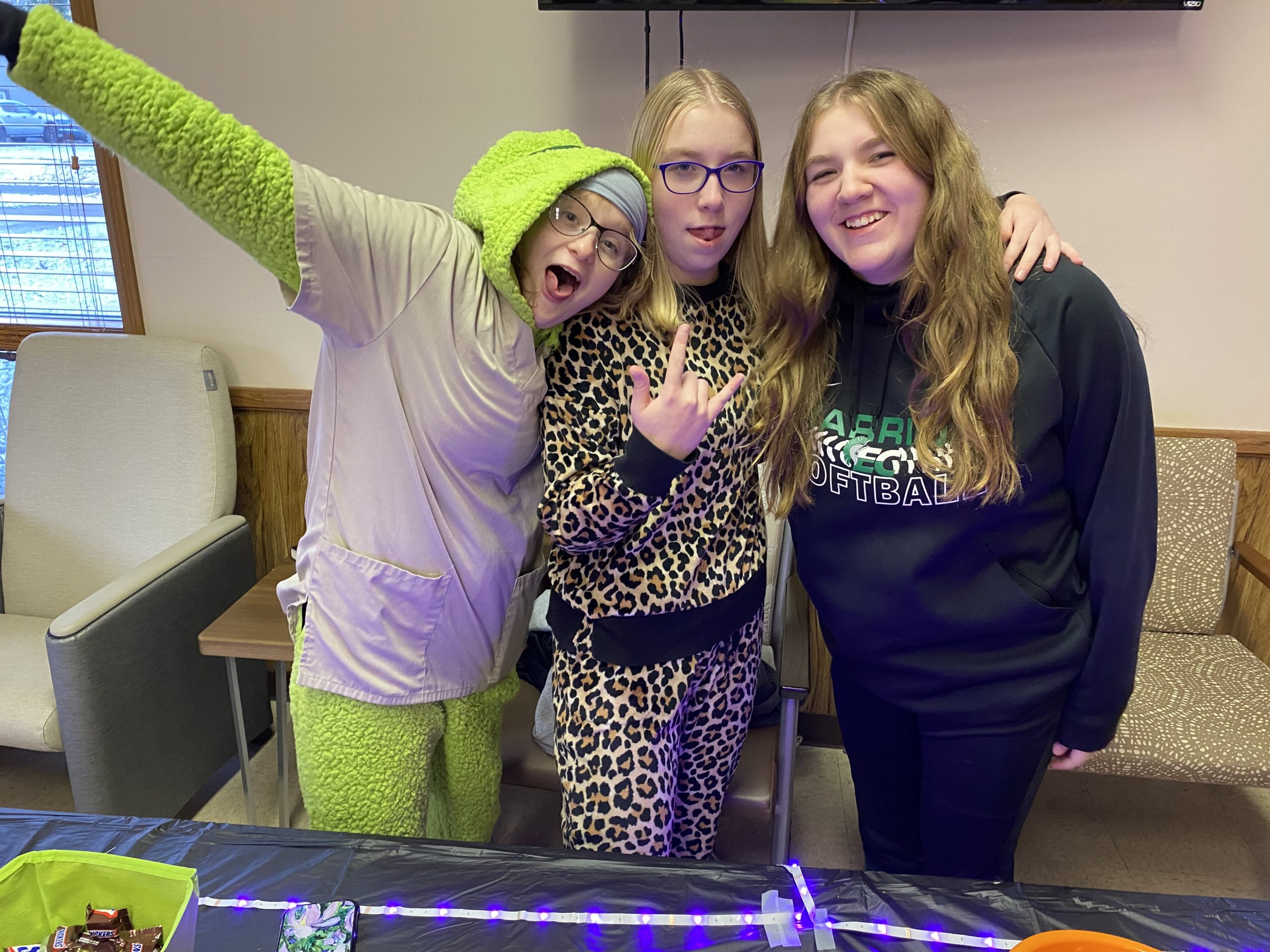 Youths Izzy, Becca, and Faith at Teen Trick or Treat