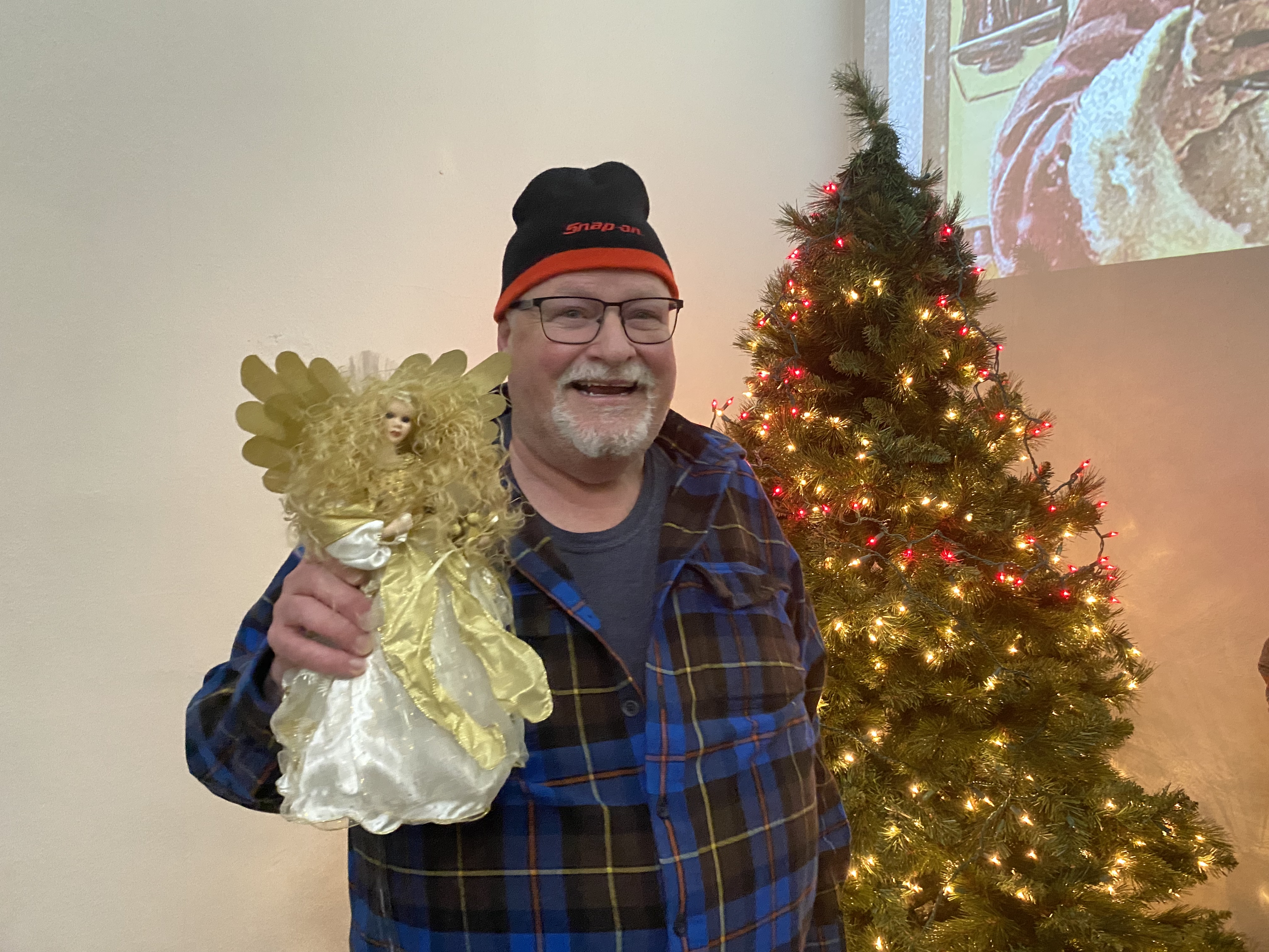 Youth Group leader Mike Haley decorating for Christmas