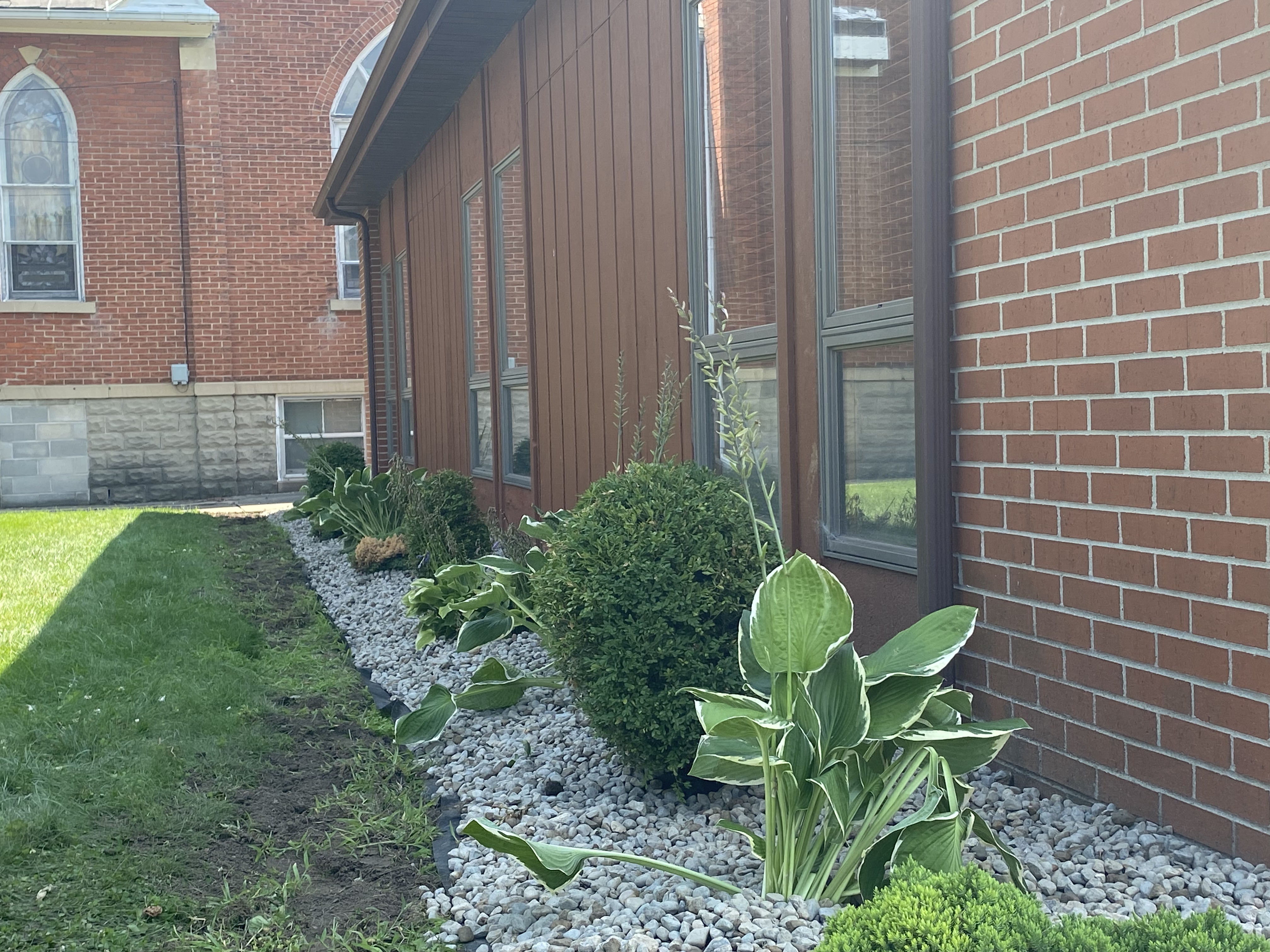 Flower garden outside church building